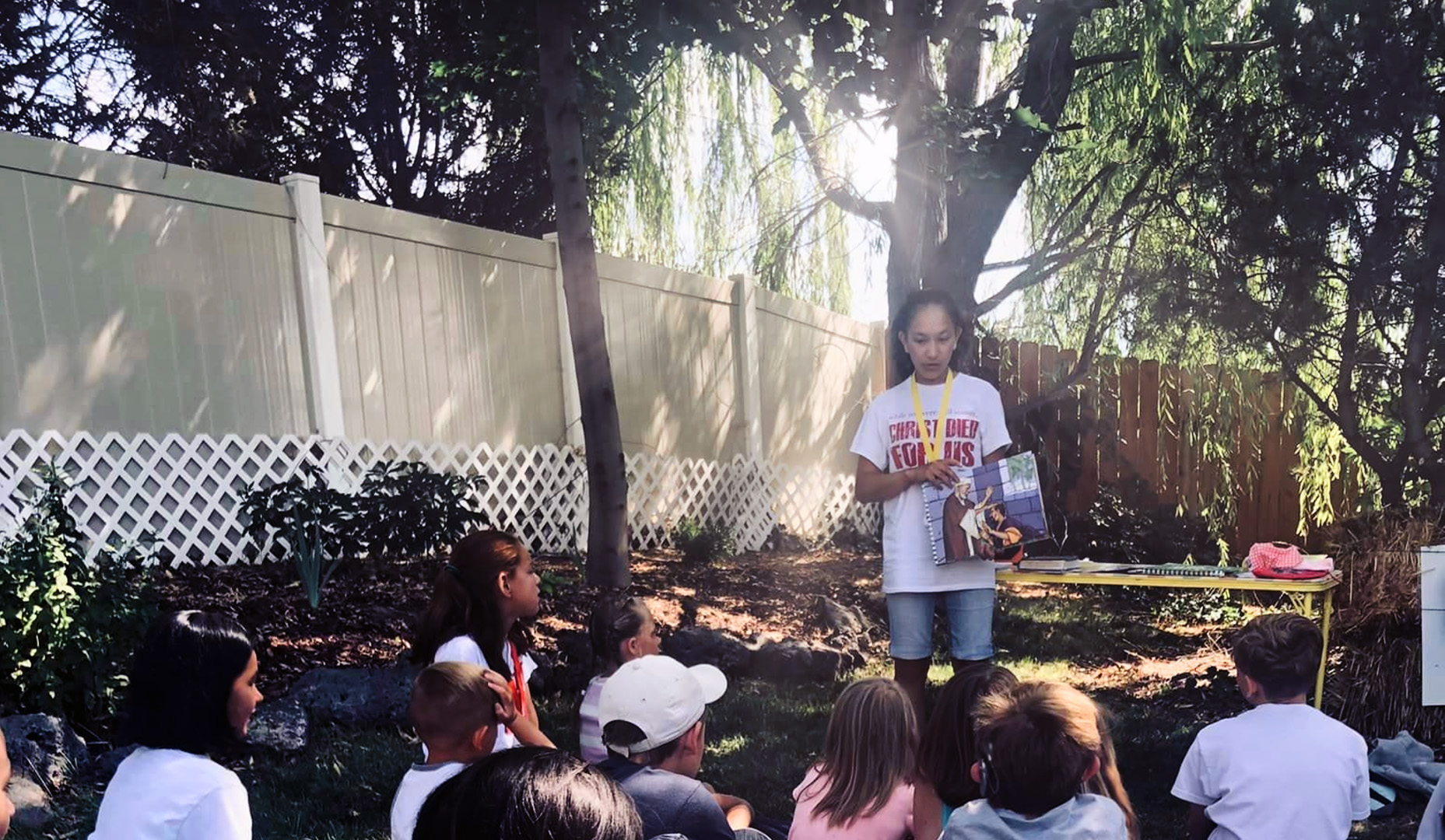Children gathering outdoors for a CEF program